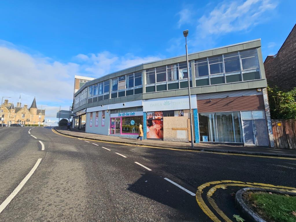 Lot: 77 - PORTFOLIO OF HIGH STREET COMMMERCIAL PREMISES (PART LET) - View of the units on Cockburn Street Falkirk